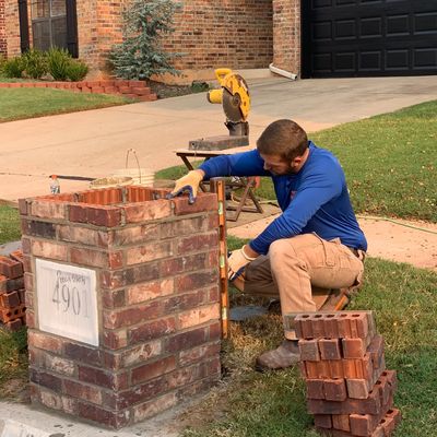 Precision Brickworks mason building a new mailbox.