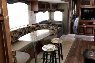 Trailer Rental #145 has a large eating space and comfortable living room.