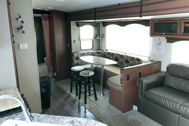 Dining space in Trailer Rental #145 has a seat for everyone.