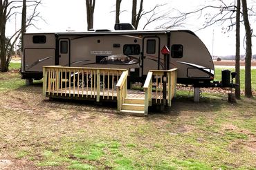 Trailer Rental #145 has a nice deck and room to sleep 8.