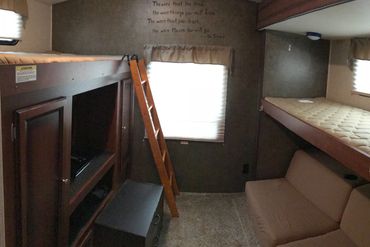 The 2nd bedroom has 2 twin beds and a comfortable couch that converts to a full size bed.