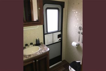 Trailer Rental #145 has an outdoor accessible bathroom!