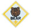 Bear patch.  The patch is light blue with the head of a bear above B-E-A-R and a Fleur de Lis.
