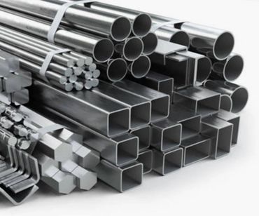 Stack of various metal pipes and rods in different shapes and sizes.