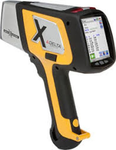 Handheld XRF analyzer device for material analysis.