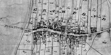 Old black and white map of a village named Grampondo with numbered plots.