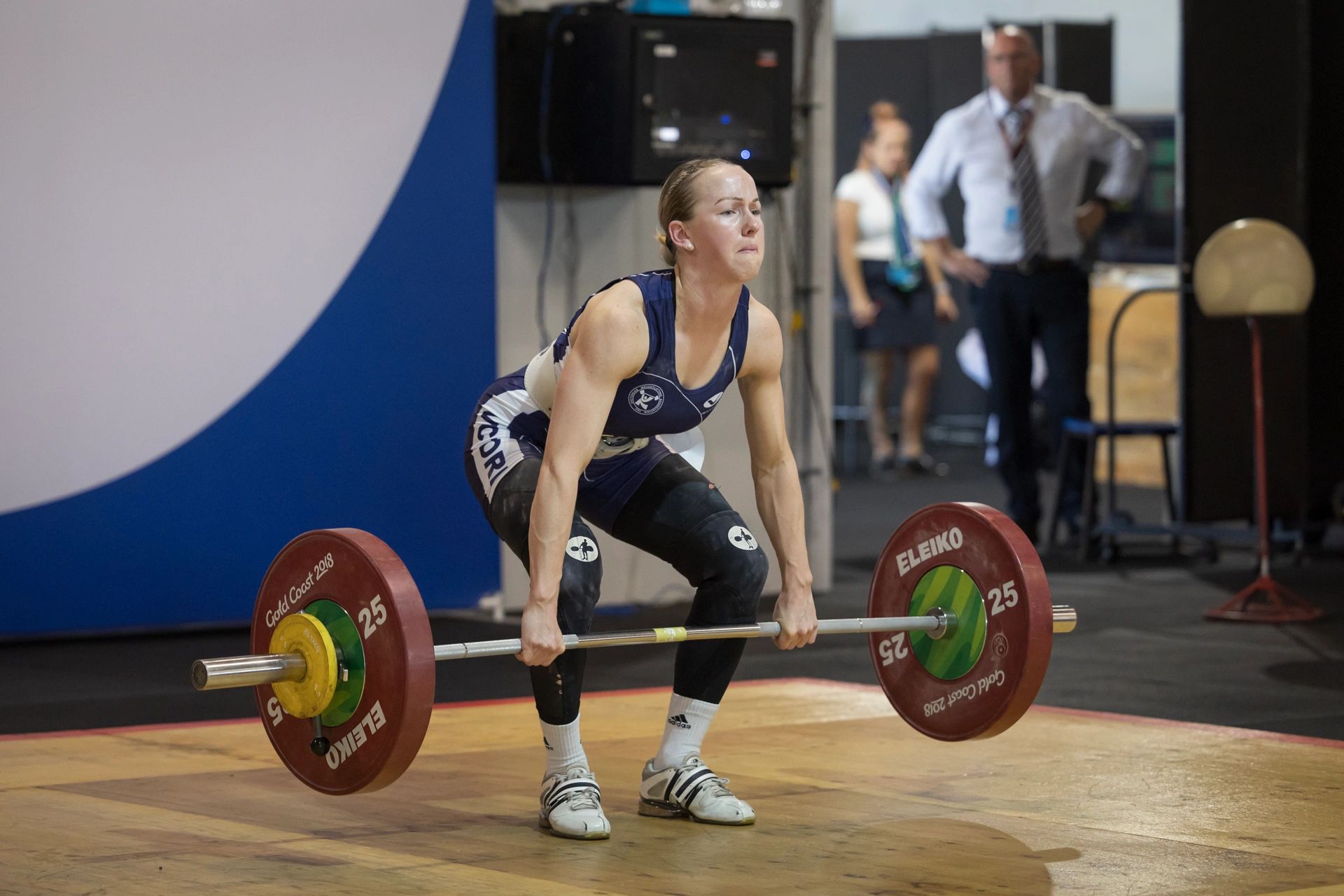 Empower strength and performance athlete lifting in an olympic weightlifting competition 