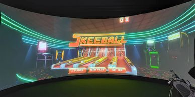 Virtual golf simulator with skeeball loaded