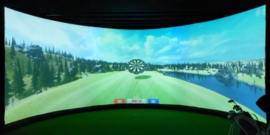 Virtual golf simulator with a game of darts loaded