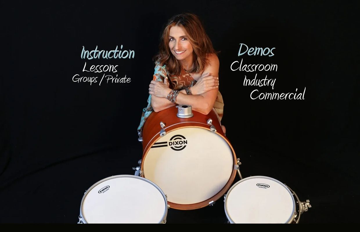 Woman with drum offering lessons and demos.