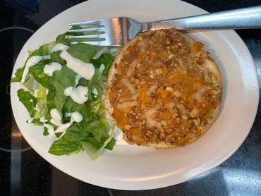 tuna melt and salad with dressing at expanding imaginations child care and daycare
