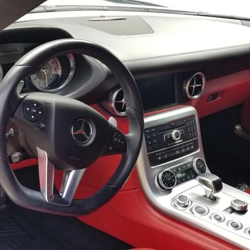 Mercedes black over red custom interior.