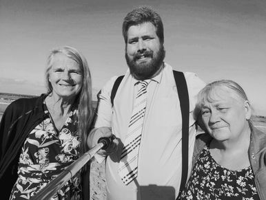 Three members stand in front of the Mediterranean Sea in the Ancient city of Joppa(Tel-Aviv).