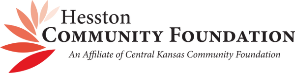 Logo of Hesston Community Foundation with colorful leaf design.
