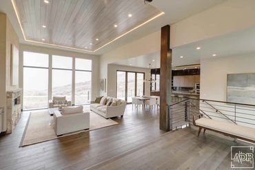 interior modern white front entrance with wooden beam