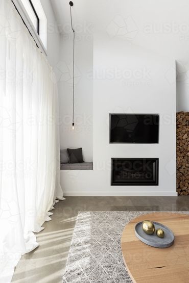 Gas log fire under TV