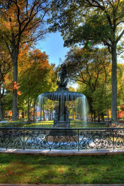 Water Fountain with fall foliage..