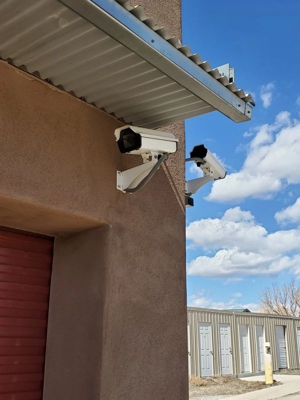 Surveillance security cameras recording 24/7.