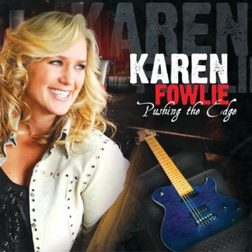 Karen Fowlie with her blue Samick guitar