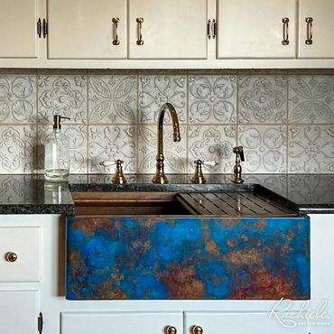 Custom copper farm sink with bold Verdigris patina in a traditional kitchen Rachiele Custom Sinks