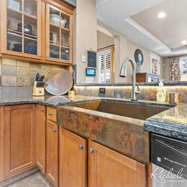 36" copper farmhouse sink with a colorful patina