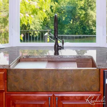 36" copper farmhouse workstation sink by Rachiele with custom accessories and a Waterstone faucet