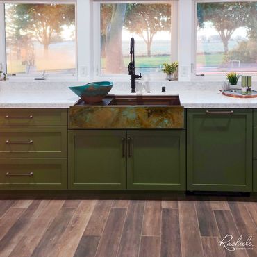 42" custom copper farmhouse sink by Rachiele in a kitchen with a lakeside view