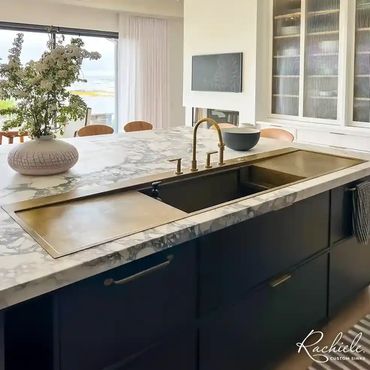 89" custom top mount brass kitchen sink with two integrated drainboards and a NexGen workstation
