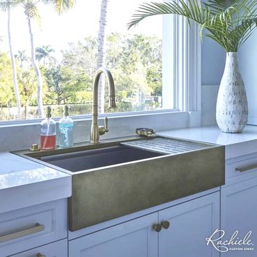 36" custom stainless steel and brass farmhouse sink by Rachiele in a south florida luxury home