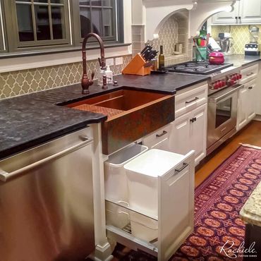double roll out trash easily fits under a copper farmhouse sink by Rachiele due to rear corner drain