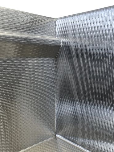 MicroWelded™ corner on a Rachiele Millennia textured stainless steel sink