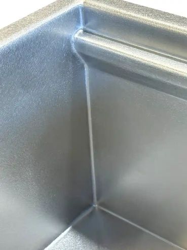 Interior 1/8" radius on the inside corner of a Rachiele custom stainless steel sink