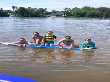 Neighborhood grandkids enjoying the lake!