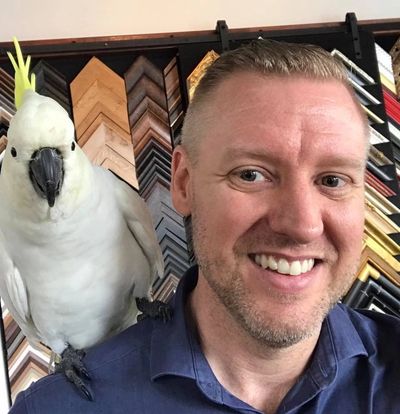 Jared Davis in a picture framing business in Brisbane, Australia