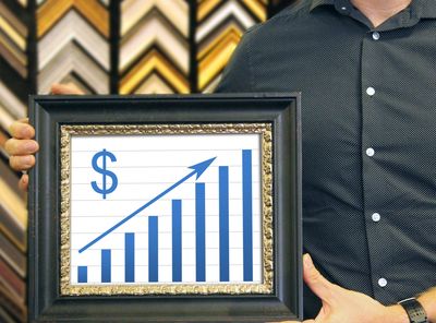 Picture frame showing a graph for  a successful framing business.