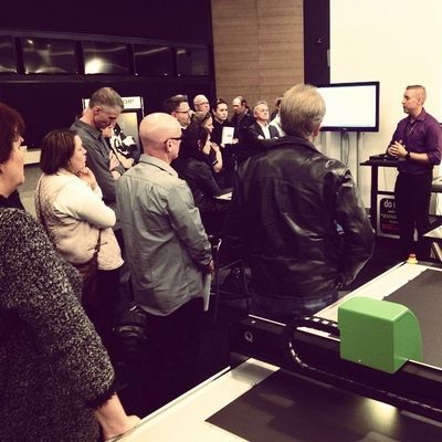 Jared Davis providing business consulting and  training to a group of business owners