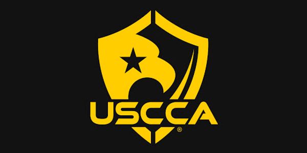 USCCA logo in yellow on a black background.