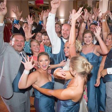 Crowd dancing at a wedding