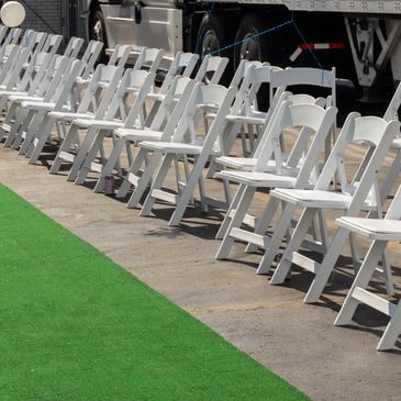 outdoor venue area with year round artificial turf green area