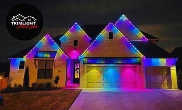 A home pictured with a pastel pink, blue, and yellow Easter-themed holiday pattern.