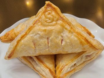 Puff pastry filled with Strawberry jelly and cream cheese filling. Baked daily at our Cuban Bakery.