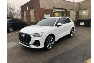 white audi tinted with 3m window film