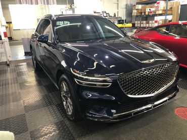 Blue Genesis truck with automotive ceramic coating inside Tint Pros Cleveland