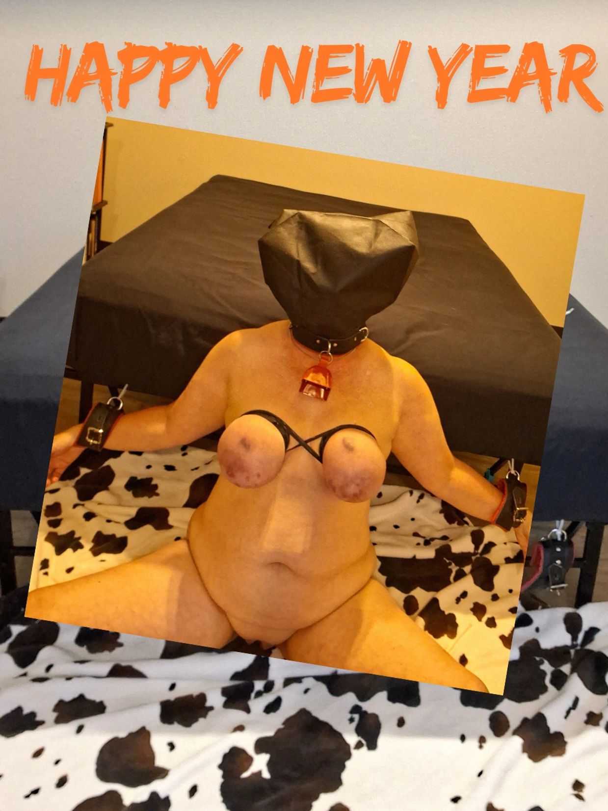 Person in BDSM gear with 'Happy New Year' text.