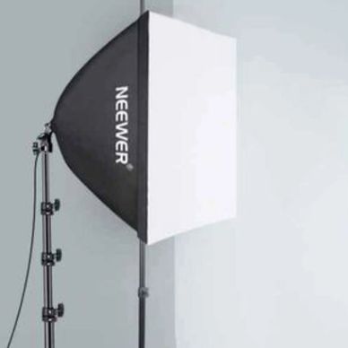Photographer soft box and background.