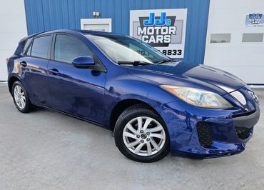 2013 Mazda MAZDA3 i Touring's photo