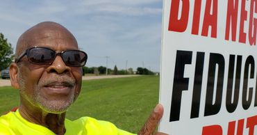 Mr. Smith rallying outside BIA building
