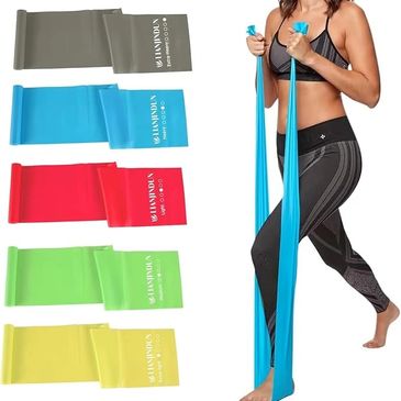 A woman is walking with a resistance band.