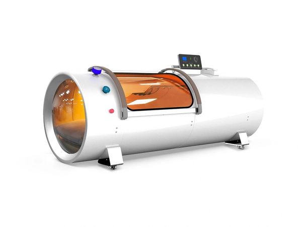 Modern hyperbaric oxygen therapy chamber with control panel.