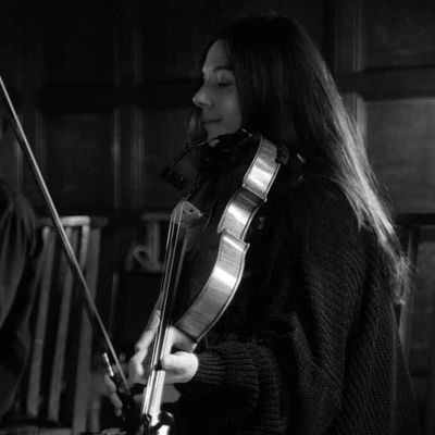Rachel performing on her violin